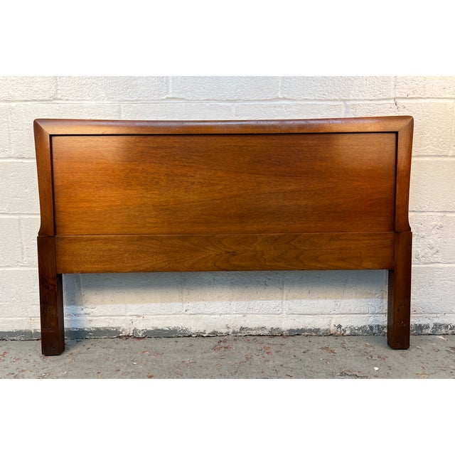 Add timeless Mid-Century Modern style to your bedroom with this Henredon 'Circa 60' walnut headboard. Crafted with the...