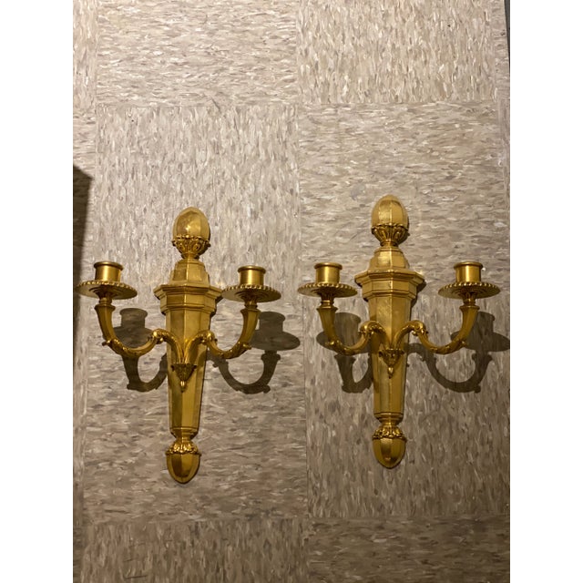 Pair of circa 1920’s Caldwell gilt bronze double lights sconces