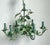 This enchanting vintage Hollywood Regency toleware chandelier is a masterful celebration of garden-inspired design....