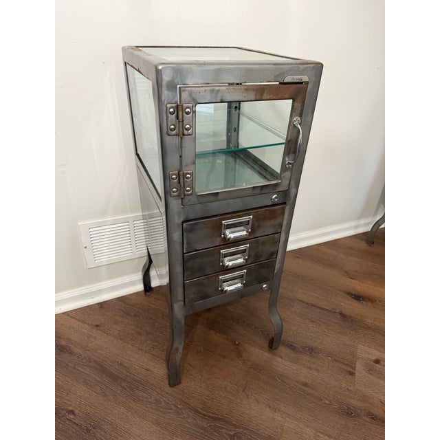Rare matched pair of authentic Restoration Hardware Pharmacy Short Cabinets With Drawers in the signature Burnished Steel...