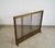 Vintage Hollywood Regency solid brass fireplace chimney screen for sale. It's really solid, and has a pull chain that...