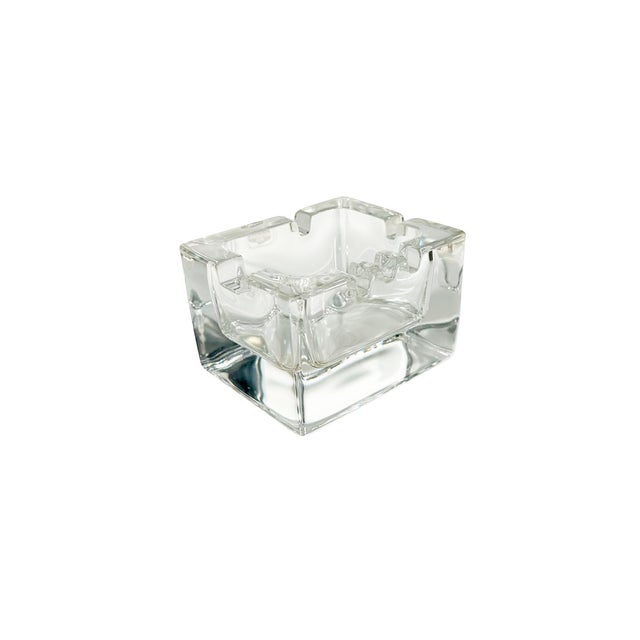 A beautiful little piece of mid-century Finnish design. This small but substantial crystal ashtray features a variety of...