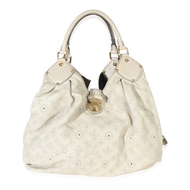 Item #: 154772 Features Interior: One zip pocket Dimensions: 15 x 13 x 7 in Handbag Closure Type: Clasp;Push Lock Handle...