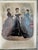 Original hand-colored French fashion plate from La Mode Illustrée, published in Paris in 1869 (No. 3). This elegant...