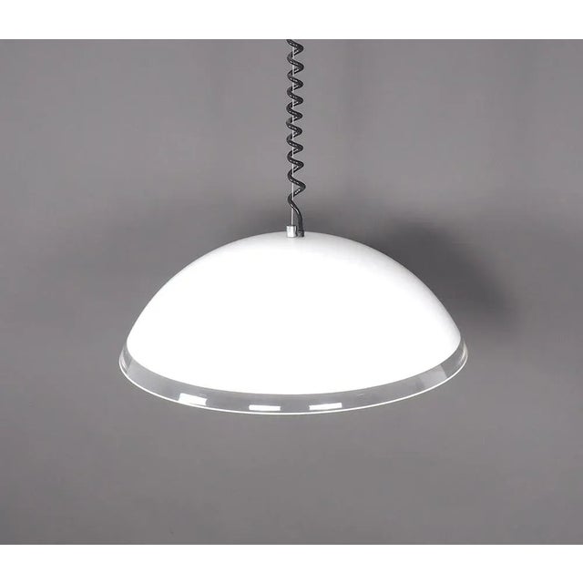 Beautiful Italian space-age design hanging lamp by Iguzzini designed in the 1970s. Designed by Franco Bresciani Model...