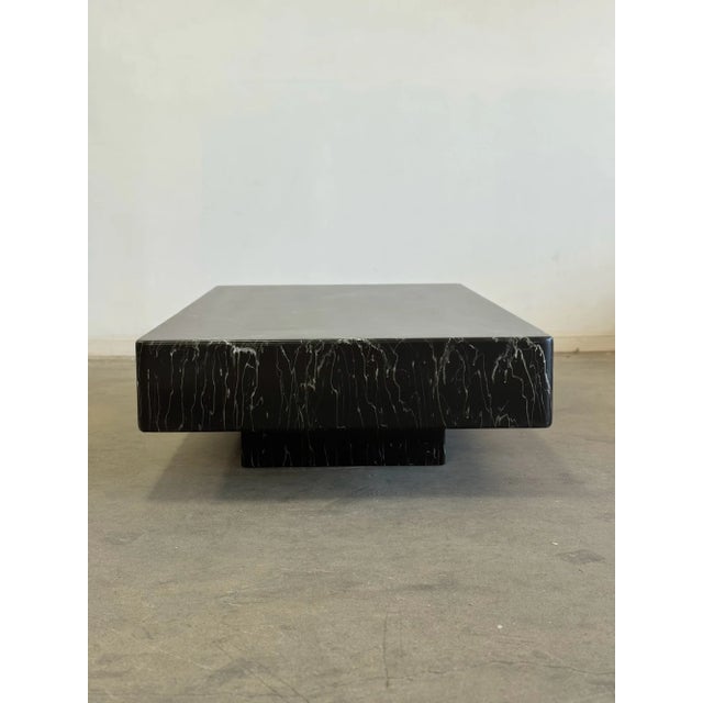 W61 H14 D35.5 Low profile soft edge table in original faux marble lacquer. Item has been lightly restored. Coffee table...