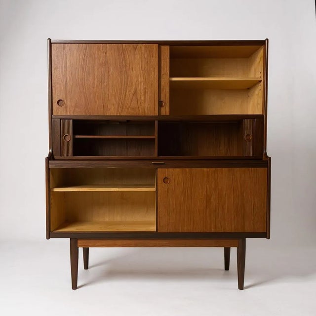 Vintage Scandinavian High Sideboard attributed to Johannes Andersen, 1970s, in Flawless conditions. Designed 1960 to 1969...