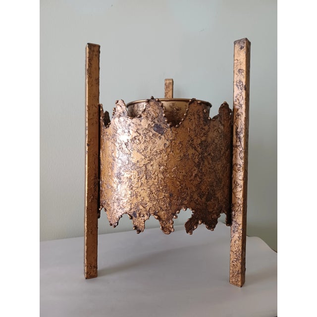 This amazing planter / plant stand has a volcanic like gold-brass leaf texture with what appears to be torch cut edges. I...