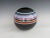 Marilyn Kay Austin Marilyn Kay Austin Style Ball Shaped Matte Black with Multi Stripe Rainbow Vase For Sale - Image 4 of 11