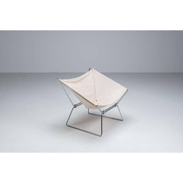 Rare model AP-14 “Anneau” lounge chair designed by Pierre Paulin for AP Polak, France, circa 1954. An iconic early design...