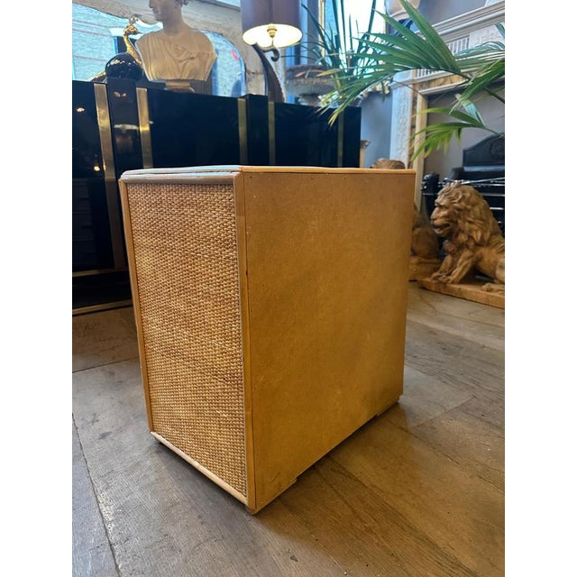 A pair of Rattan and bamboo bedside drawers. Bank of 3 on each, Simple pull handles all working and in good order. A...
