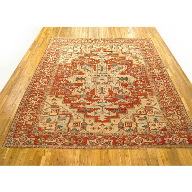 Antique Persian Serapi Oriental Rug, in Room size An antique Persian Serapi oriental rug, size 12'4" x 10'0", circa 1900....