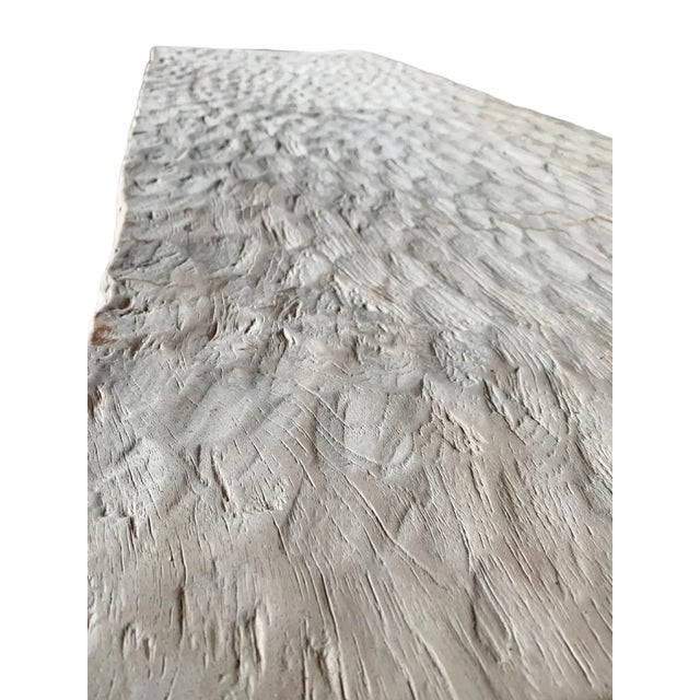 This teak coffee table was crafted on the island of Madura off the Northeastern coast of Java, Indonesia. It features...