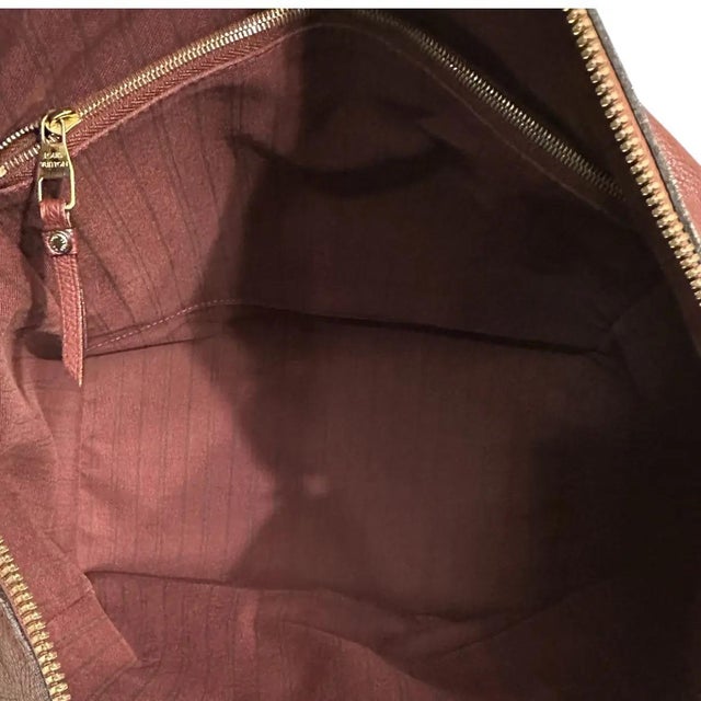 Louis Vuitton Monogram Empreinte Lumineuse PM. Beautiful & durable LV Monogram embossed leather. A sizable bag to meet all...