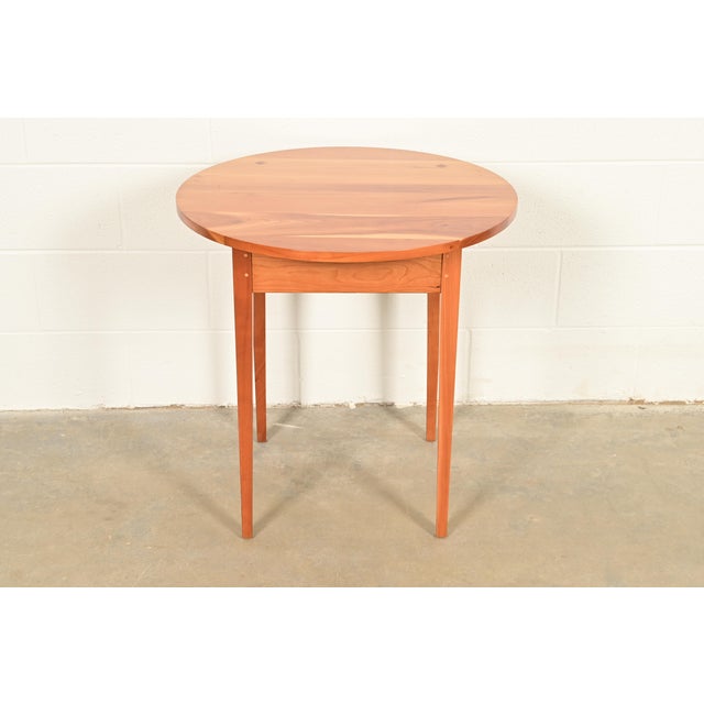 A beautiful Arts and Crafts or Shaker style solid cherry wood occasional side table or tea table By Harden Furniture USA,...
