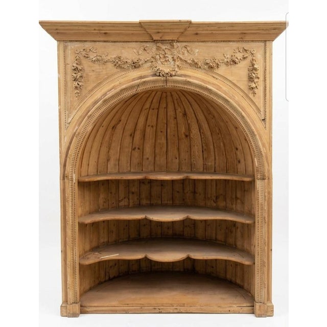 A Pine Barrel-Back Corner Cupboard is a traditional architectural furniture piece designed to sit flush in a 90-degree...