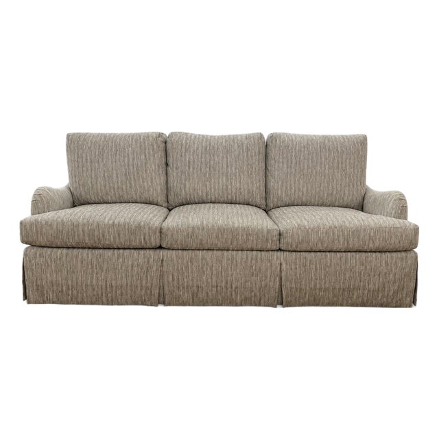 Kravet Tailor Sofa. Maple Frame - A Classic Design Featuring Rolled Arms, Skirted Bottom. Upholstered in a Slub Weave in Tones of Ivory, Taupe & Gray. For Sale
