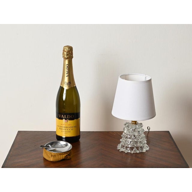 Wonderful pair of table lamps in murano mouth-blown rostrato glass and brass. These incredibly elegant and rare table...