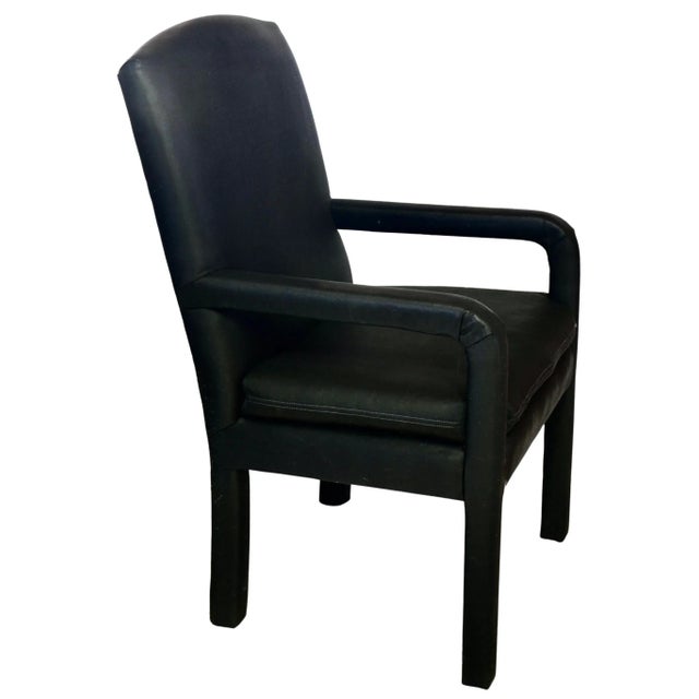 A comfortable set of eight post modern Parsons style dining room chairs with 3 inch cushioned seats and upholstered...