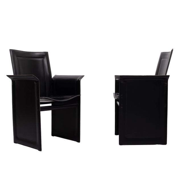 Elevate your dining experience with the Tito Agnoli Leather Chairs , a masterpiece of Italian design from 1979. vintage...