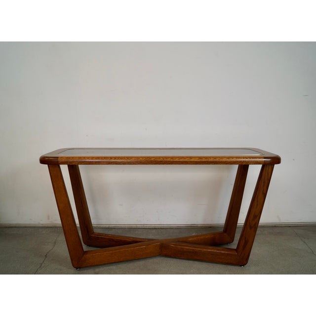 Vintage 1970's Mid century Modern entrance table for sale. It has an architectural design in the manner of Adrian...