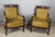 A pair of very original Empire-style mahogany armchairs from the late 19th and early 20th centuries. These carved mahogany...