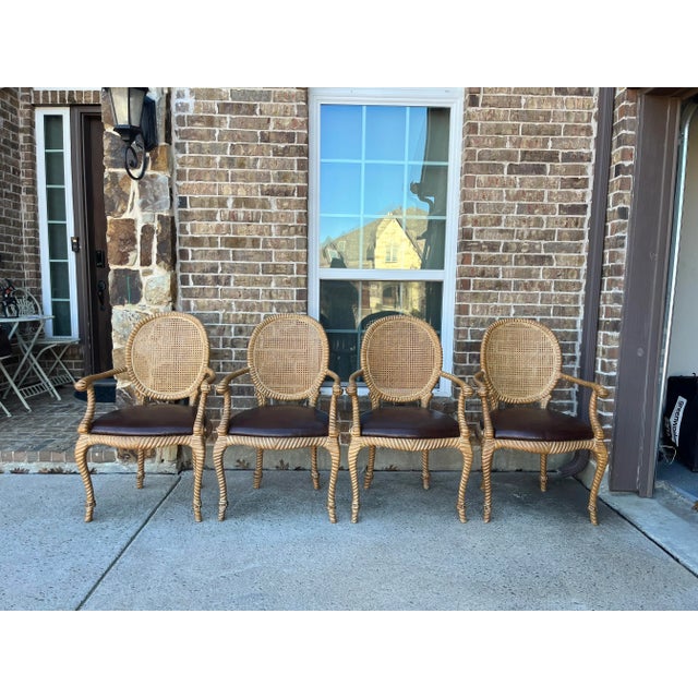 Set of 2 (Sold per Set of 2) Only 1 more set available Twisted and knotted Rope motif or design Carved Wood Arm chairs...