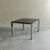 Striking Mid-Century Elegance: Saporiti Dining Table by Giovanni Offredi. The table exhibits a refined modernist...