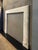 An elegant yet simple surround, executed in variegated Calacatta Italian marble. The square foot blocks supporting simple...