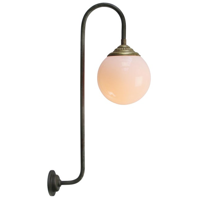 Cast Iron wall light White opaline glass, brass top. Height of wall piece up to the enamel shade: 35 cm / 13,78 inches...