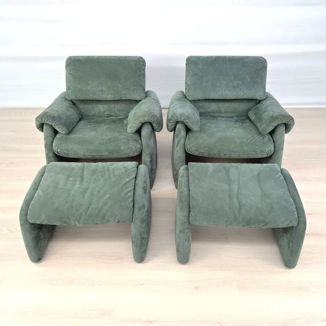 Sculptural lounge chair and matching ottoman in the style of Vico Magistretti, featuring bold architectural lines, angled...