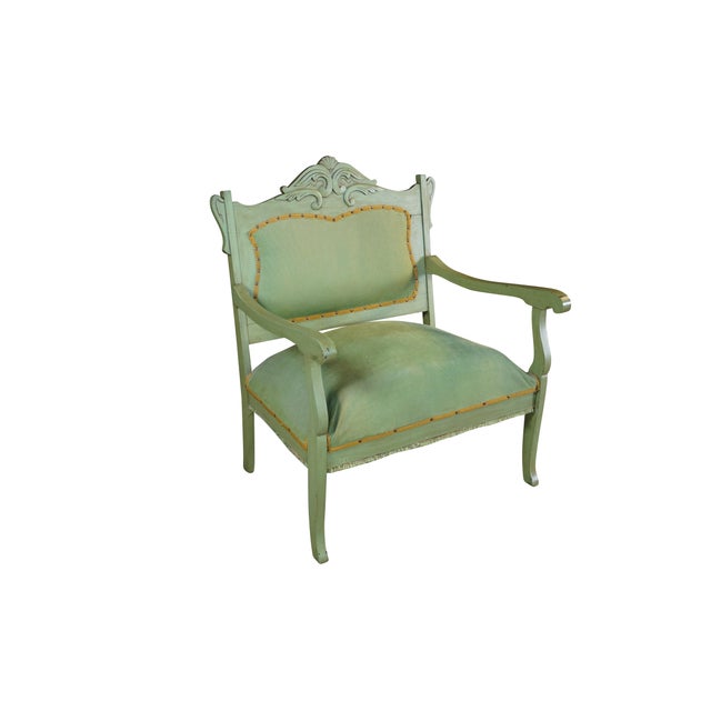 This vintage accent armchair beautifully blends Victorian, French Country, and Louis XV style elements into a single,...