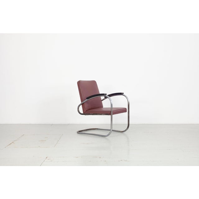 Cantilever chair "RS 7", two chairs, manufactured by Mauser. The chairs are in original condition. The seat and backrest...