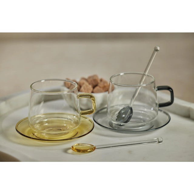 This beautiful set adds a touch of elegance and sophistication to any table setting. The color is reminiscent of nature...