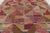 This oversized 10x14 Scandinavian rug explores modern geometry through an expressive composition of layered forms and...