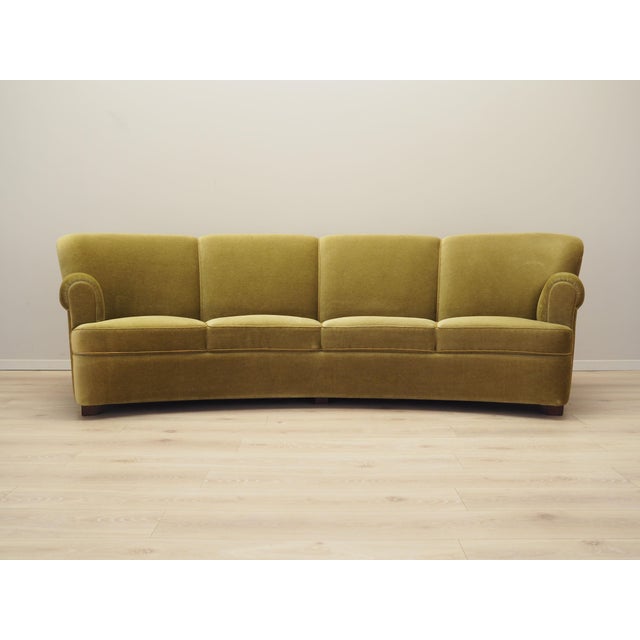The sofa was made in the 1960s, Danish production. The structure of the furniture is made of solid wood. Legs made of...