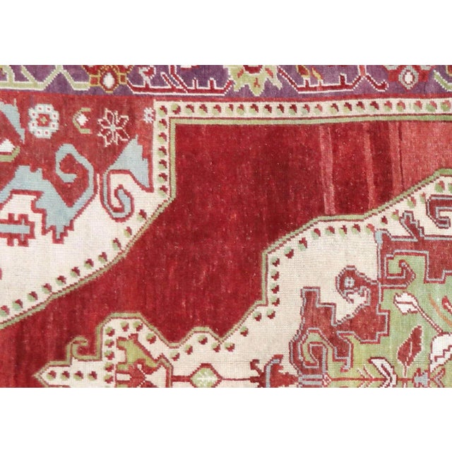 1960s Turkish Oushak Rug. Hand woven with wool on wool foundation in the Oushak region of Western Turkey. The Anatolian...