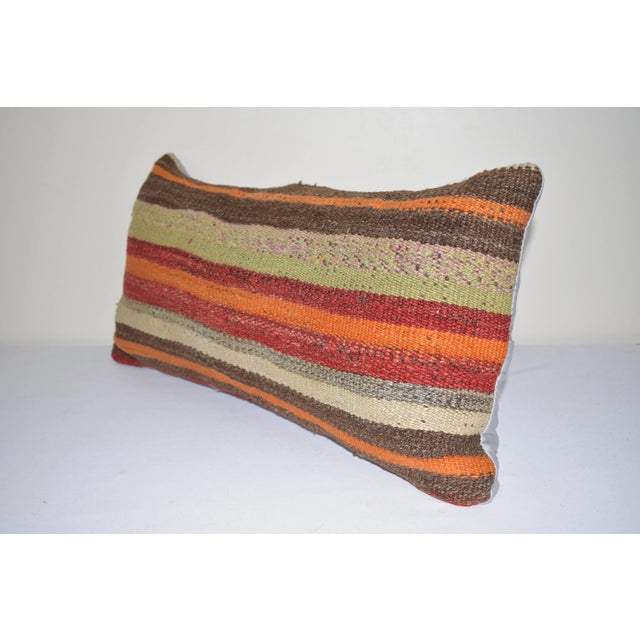 Striped Wool Kilim Pillow Cover These beautiful 12" x 24" pillow covers were made from an authentic, vintage Turkish rug...