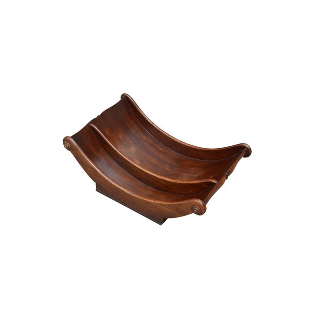 A fine quality george iii, boat shaped mahogany cheese coaster with carved pateraes to sides and 2 compartments, all...