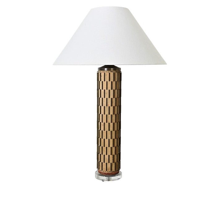 Dimensions: 36 ¾” H x 24” W x 24” D A wonderful repurposed–or upcycled–vintage wallpaper ink roller into a table lamp....