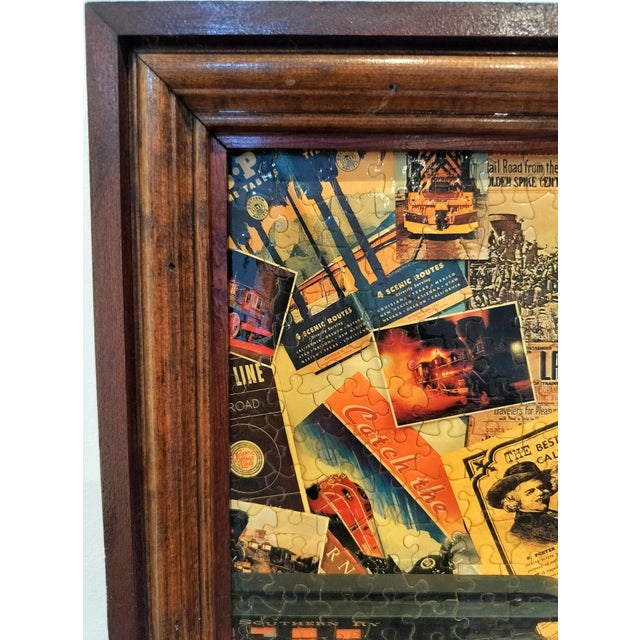 Vibrant mounted and framed puzzle of vintage train paraphernalia. Circa 1960's. Measures 21-7/8" high x 27-7/8" wide.