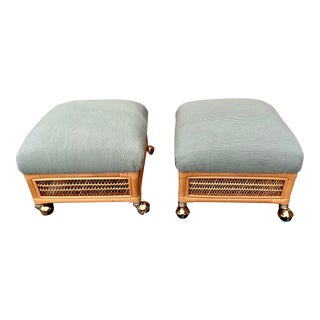 1980s Coastal Style Upholstered Rattan Ottomans / Foot Stools With Casters. (A Pair) For Sale