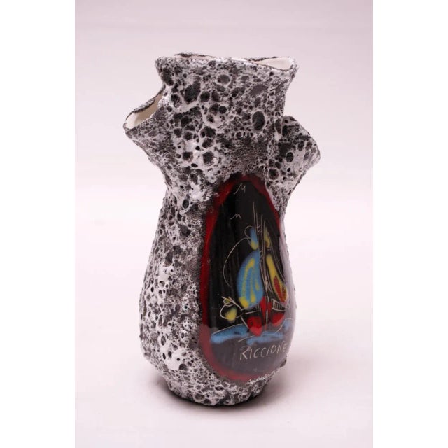 Circa 1950s Italian ceramic vase depicting a boat scene in Riccione, an Italian town on the Adriatic coast. Features a...