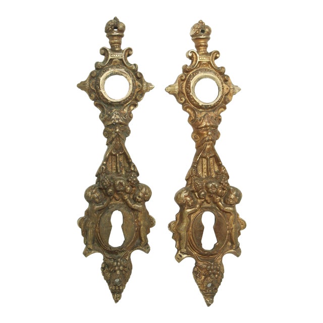 Pair of Highly Ornate Cherubic Figural 9.375 In. Back Plates For Sale
