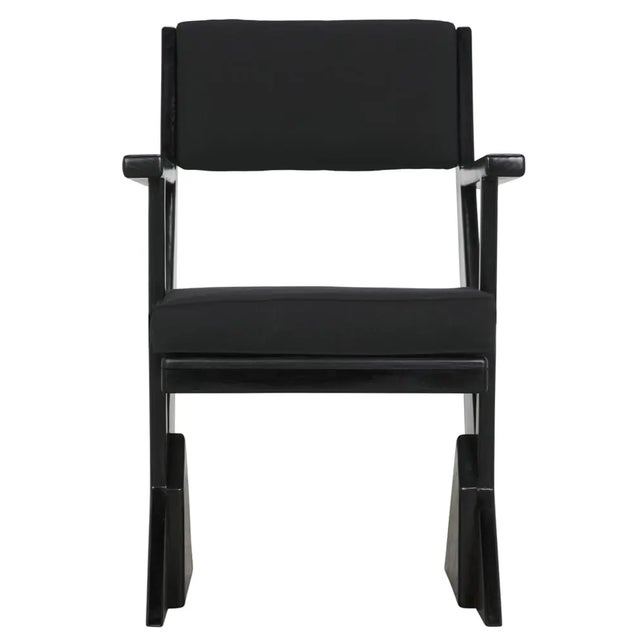 The Madoc Armchair is a unique design suggesting mid-century modern, architect driven designs with angular leg lines...