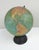 Vintage 1930's 7" size Replogle child’s globe, coated paper gores over cardboard, time dial at North Pole, routes of...