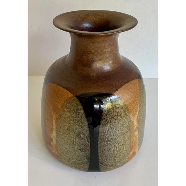 Here is a beautiful ceramic vase attributed to Robert Maxwell, designer and produced by Pottery Craft. There are no...