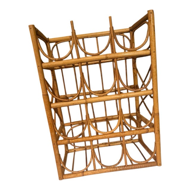 I have a thing for rattan. I can’t help it. This vintage rattan wine rack holds 12 standard 750ml bottles across four...