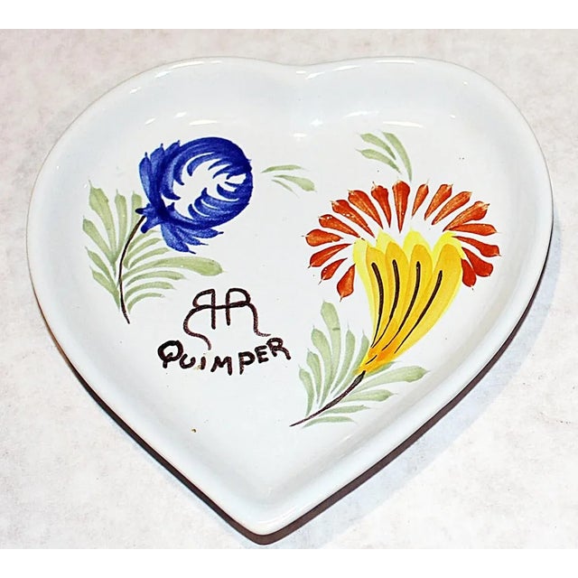 Heartwarming hand-decorated Quimper faience heart shaped nut dish with a Thanksgiving motif. Minimal wear.