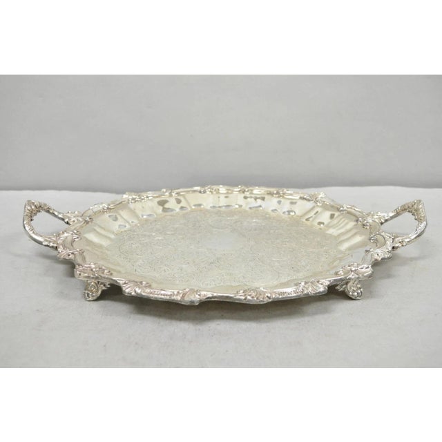 Vintage Victorian Silver Plated Round Scalloped Twin Handle Bar Serving Tray Raised on Feet. Circa Mid 20th Century....
